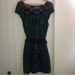 Green and black lace dress.
